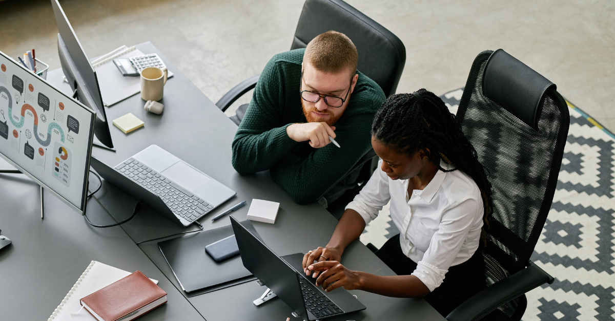 colleagues working together in office