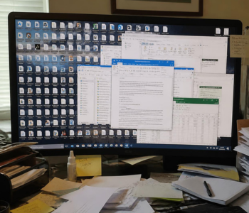 desktop with unorganized documents